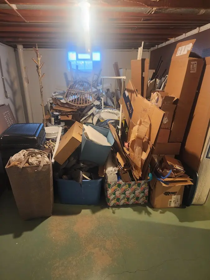 Roll-off dumpster container at job site for Construction Dumpster Rental in Barry